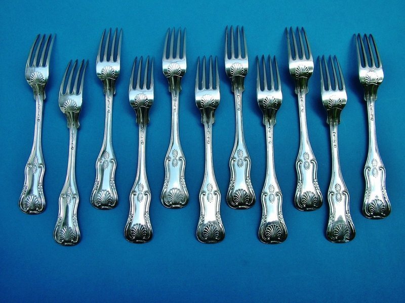 11 coin silver King's banquet sized dinner forks
