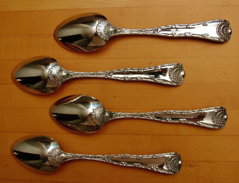 four Tiffany WAVE EDGE dessert spoons a/k/a oval soups