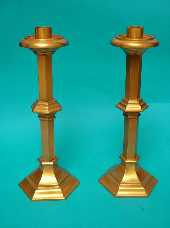 a fine pair of Gorham gilt bronze candlesticks,