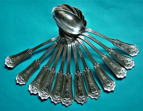 John Cook "Anthemion" coin silver teaspoons, 12