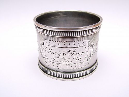 Thoroughly charming coin silver napkin ring,