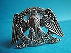 a good pair of Belgian Eagle motif silver knife rests,