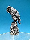 a fine full figural owl desk seal,  pale emerald eyes