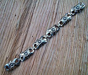 floral link sterling bracelet by the famous "EB"  Co.