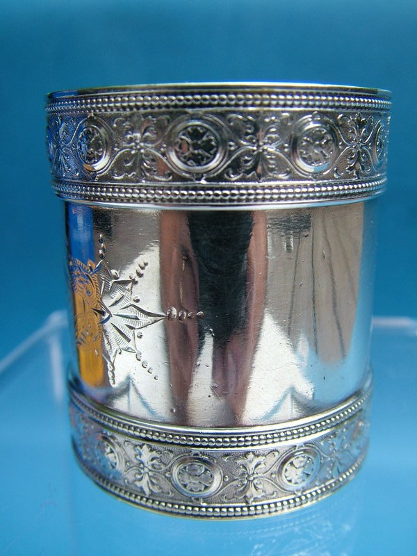 a good Gorham  (?) napkin ring with Islamic style
