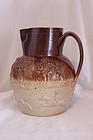 Stoneware hunting jug