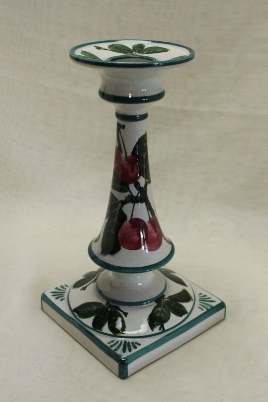 Wemyss candlestick decorated with cherries.