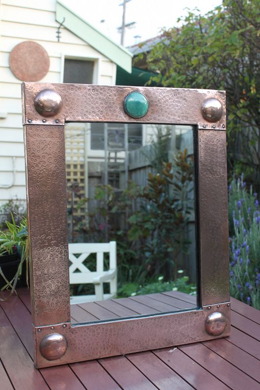 Arts and Crafts beaten copper framed mirror