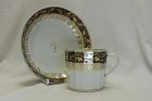 Blue and gilt decorated coffee can and saucer possibly Coalport