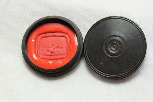 Wax seal impression in a turned ebony box 29 mm diameter