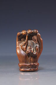 Japanese Carved Rosewood Netsuke Figure. Hand & Monkey.