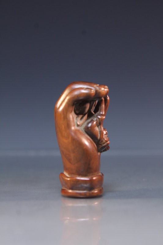 Japanese Carved Rosewood Netsuke Figure. Hand &amp; Monkey.