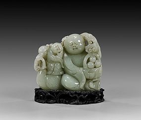 Chinese Carved Celadon Jade Figural Group.