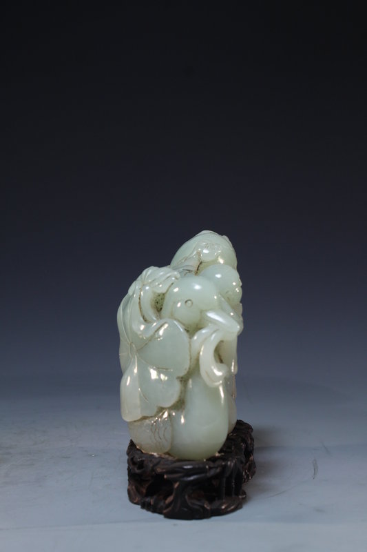 Chinese Carved Celadon Jade Figural Group.