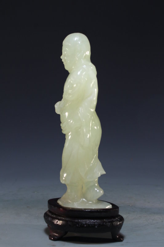 Chinese Carved Serpentine Jade Figure.