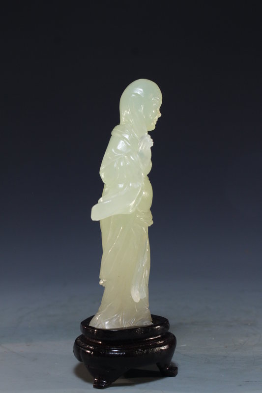 Chinese Carved Serpentine Jade Figure.