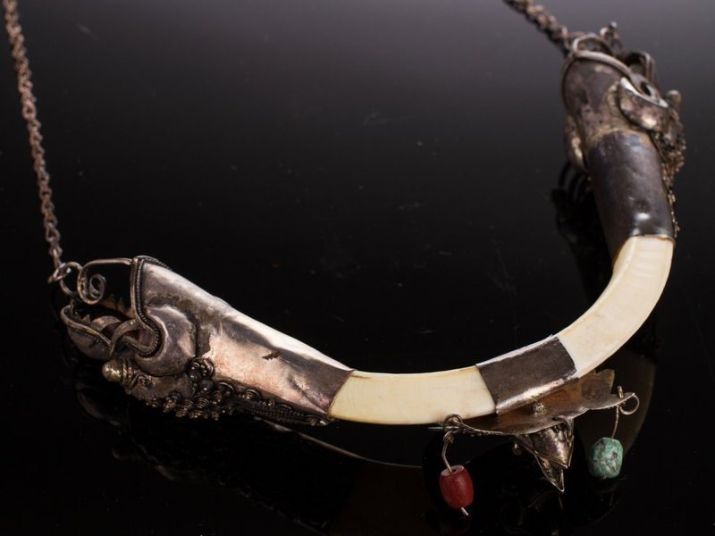19 C. Indo/Tibetan Silver Dragon Boar Tusk Necklace.