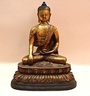 Antique Sino-Tibetan Gilded Cast Figure of Buddha.