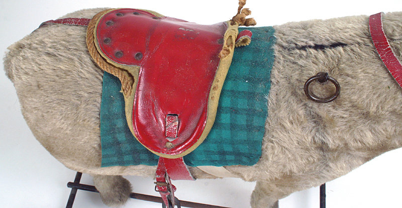 Steiff donkey riding pull toy with button