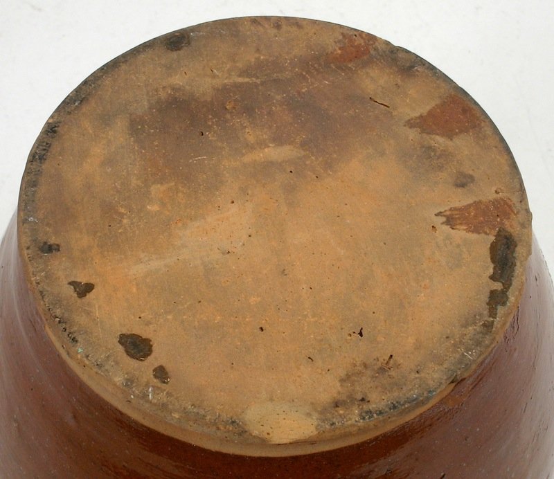 Antique Redware pottery ovoid jar in brown glaze