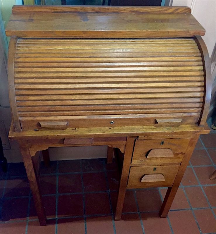Antique small size oak roll top desk