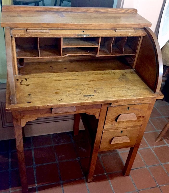 Antique small size oak roll top desk