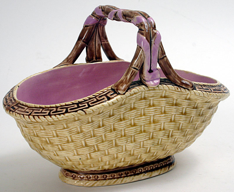 Antique majolica pottery basket, woven design