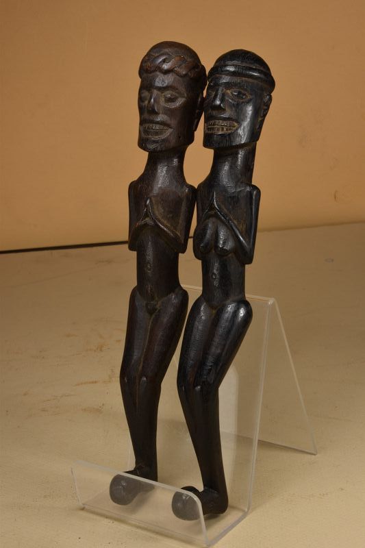 A Rare Pair of Dayak Amulets