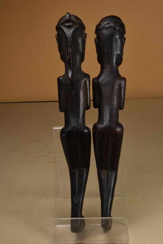 A Rare Pair of Dayak Amulets