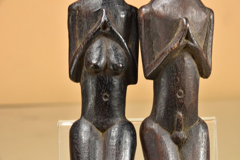 A Rare Pair of Dayak Amulets