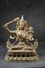 Lacquered & Gilt Bronze Statue of Manjusri, China, Late 19th century.