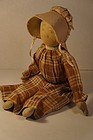 Pencil face prairie type cloth doll brown dress  tan bonnet antique