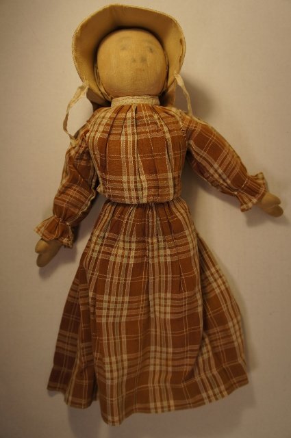 Pencil face prairie type cloth doll brown dress  tan bonnet antique