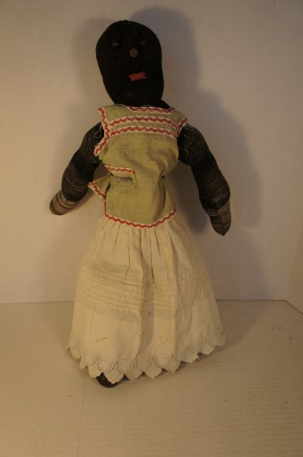 Antique black sock doll with button eyes rag stuffed