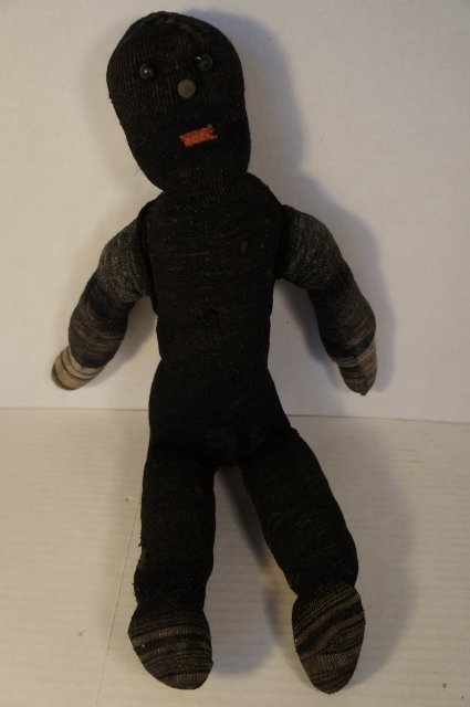Antique black sock doll with button eyes rag stuffed