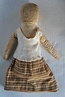 Early cloth doll with pencil face antique brown ticking skirt