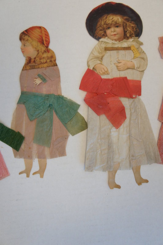 19th C. paper dolls with crepe paper dresses  10&quot;