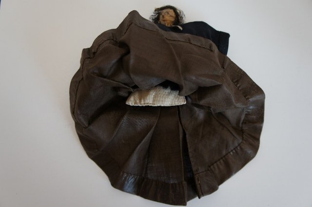 Small nut doll Civil War Era with black dress, early petticoat antique