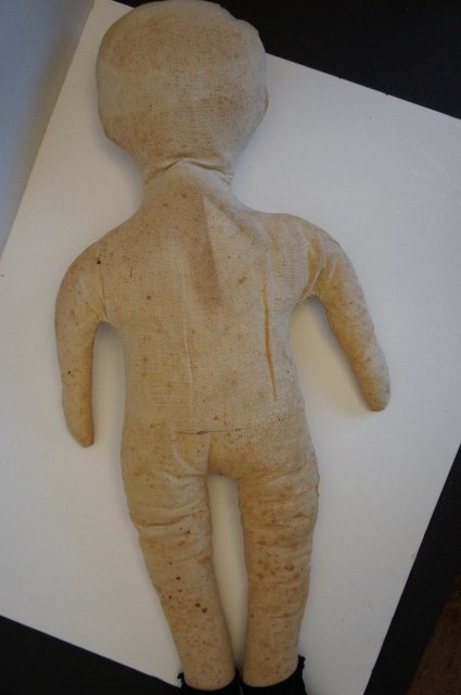 Simple country antique rag doll with ink drawn face