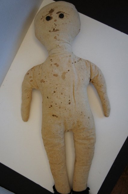 Simple country antique rag doll with ink drawn face
