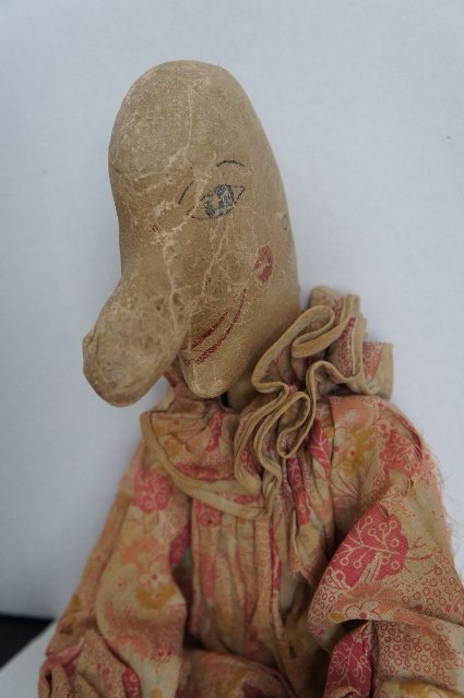 A 19th c Punch as in Punch and Judy orig. clothes leather face