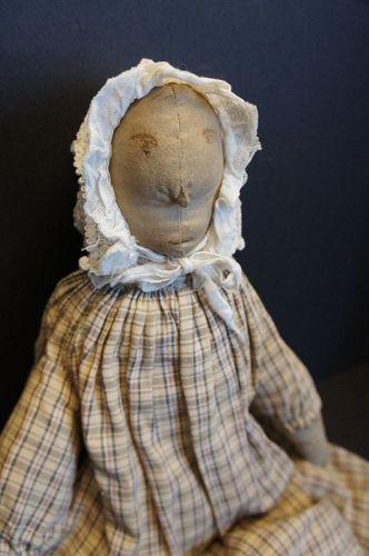 Her name is Ruby she is big strong ink drawn face cloth doll 22"