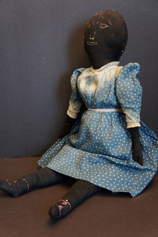 A special black cloth doll with embroidered face 21&quot; antique