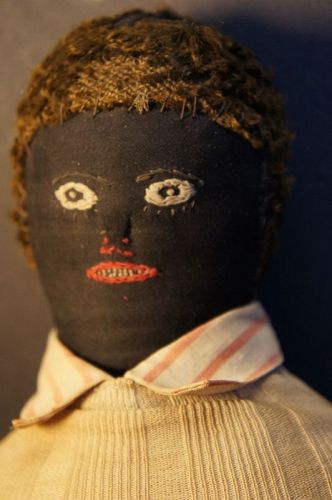18" black boy doll with very fine embroidered face C. 1880 antique