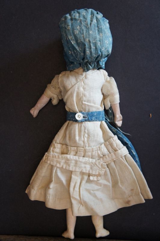 Amazing squeak toy doll in original dress  bisque head glass eyes 11&quot;