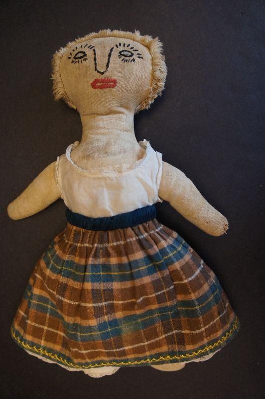 A strong statement for a little girl, antique cloth doll