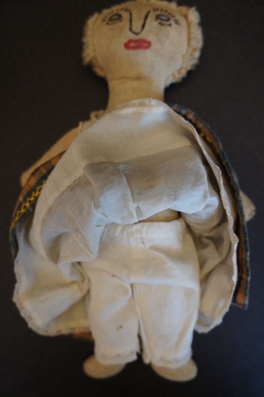 A strong statement for a little girl, antique cloth doll