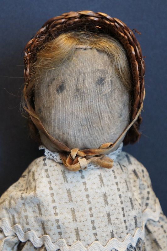 A sweet little &quot;Petunia&quot; cloth doll with a pencil face 14&quot; circa 1890