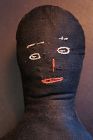 A big nice embroidered face black cloth doll  19th C. 24" tall