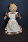 C. 1900 stockinette stump doll with brown calico dress. 14"